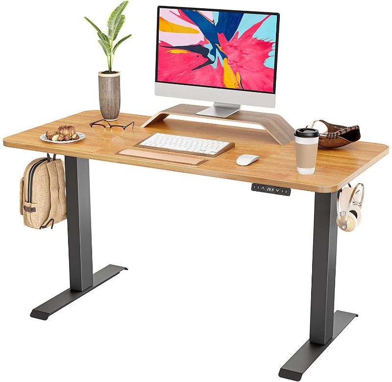 Photo 1 of FAMISKY Dual Motor Adjustable Height Electric Standing Desk, 40 x 24 Inches Stand Up Home Office Desk with Splice Tabletop, Black Frame/Rubberwood Top
