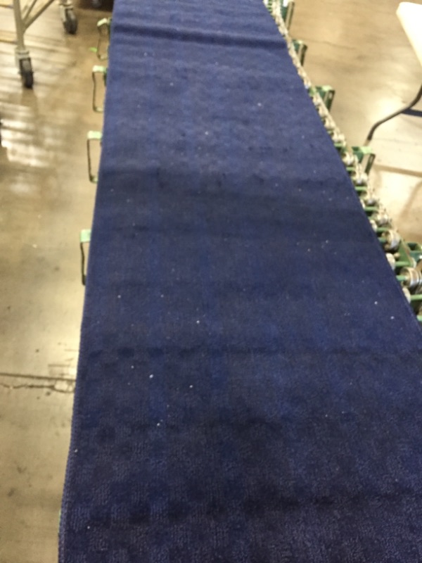 Photo 1 of 2' x 8' dark blue checker runner