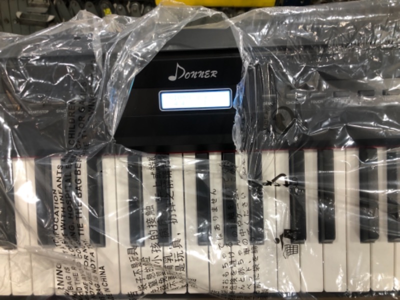 Photo 3 of Donner DEP-20 Beginner Digital Piano 88 Key Full Size Weighted Keyboard, Portable Electric Piano with Sustain Pedal, Power Supply (1 key is broken)
