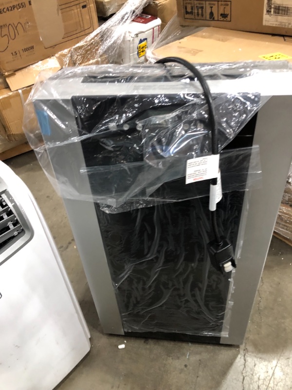 Photo 2 of Whynter ARC-14S 14,000 BTU Dual Hose Portable Air Conditioner, Dehumidifier, Fan with Activated Carbon Filter Plus Storage Bag for Rooms up to 500 sq ft, Platinum and Black
DOES NOT TURN ON.