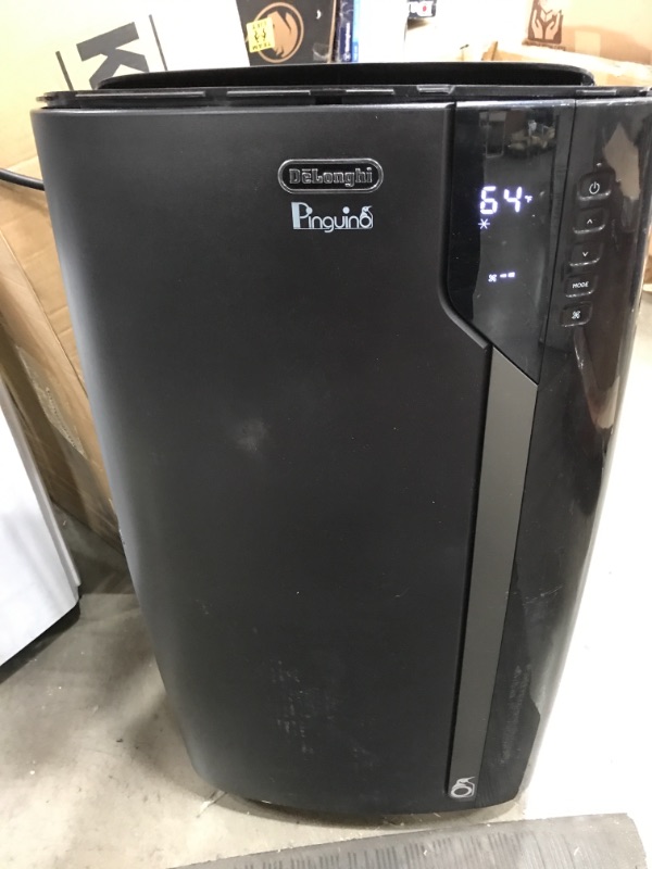 Photo 2 of De'Longhi 14000 BTU Portable Air Conditioner, Dehumidifier & Fan + Cool Surround Remote w/Built-in Temperature Control Sensor & Quiet Mode, 700 sq ft, XLarge Room, Pinguino 8600 BTU (DOE), Black. MISSING PIECES, BROKEN ON SIDES AND TOP.
