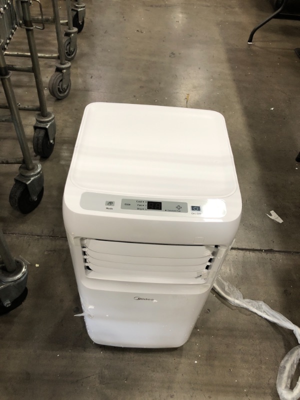 Photo 2 of MIDEA 3-in-1 Portable Air Conditioner, Dehumidifier, Fan, for Rooms up to 175 sq ft, White