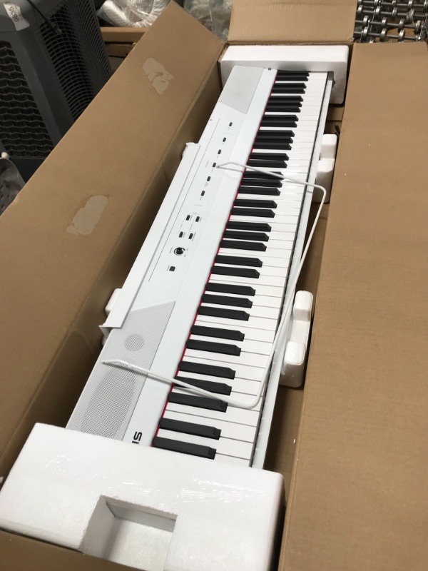 Photo 2 of Alesis Recital White | All White 88-Key Digital Piano / Keyboard with Full-Size Semi-Weighted Keys, Power Supply, Built-in Speakers and 5 Premium