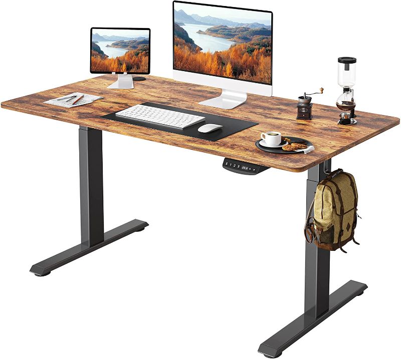 Photo 1 of FEZIBO Height Adjustable Electric Standing Desk, 48 x 24 Inches Stand up Table, Sit Stand Home Office Desk with Splice Board, Black Frame/Rustic Brown Top
