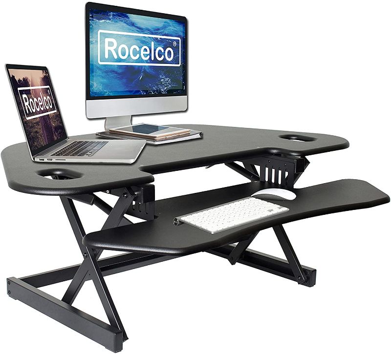 Photo 1 of Rocelco 46" Height Adjustable Corner Standing Desk Converter, Quick Sit Standup Dual Monitor Riser, Gas Spring Assist Tabletop Computer Workstation, Large Keyboard Tray, (R CADRB-46), Black
