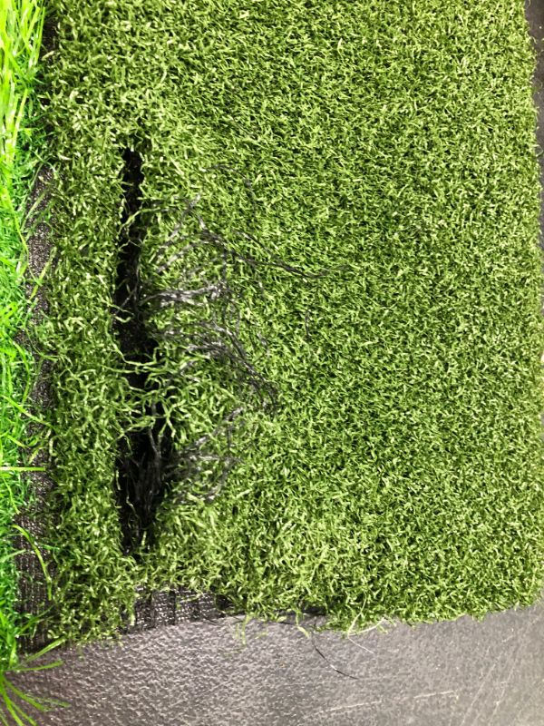 Photo 2 of Milliard Golf 3-in-1 Turf Grass Mat Foldable Includes Tight Lie, Rough and Fairway for Driving, Chipping, and Putting Golf Practice and Training - 25x1 inches.2, One Section Torn