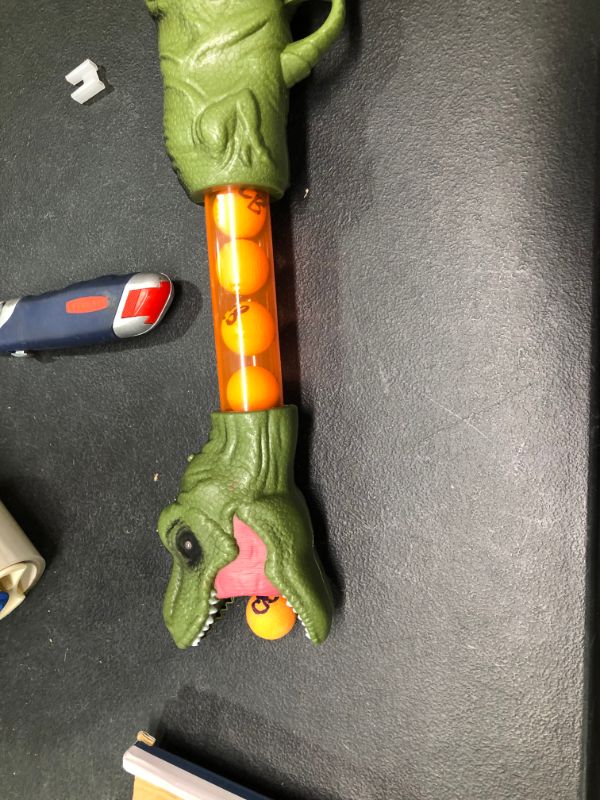 Photo 1 of Dinosaur T-Rex Popper Gun