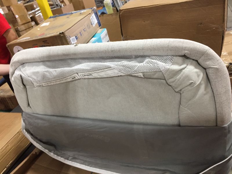 Photo 4 of unilove Grey Hugme Plus Bedside Sleeper Bassinet Includes Mattress and Travel Bag
