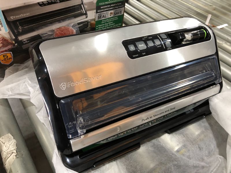 Photo 1 of 2-in-1 Black/Stainless Steel Vacuum Sealer System with Starter Kit