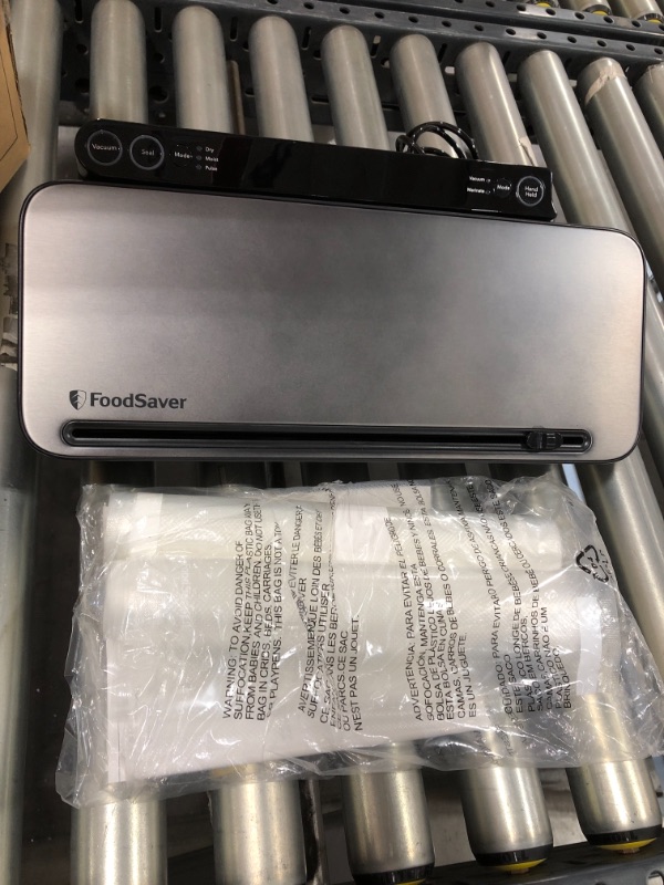 Photo 2 of FoodSaver VS3150 Multi-Use Vacuum Sealing & Food Preservation System with Additional Roll, Charcoal Stainless Steel, Black