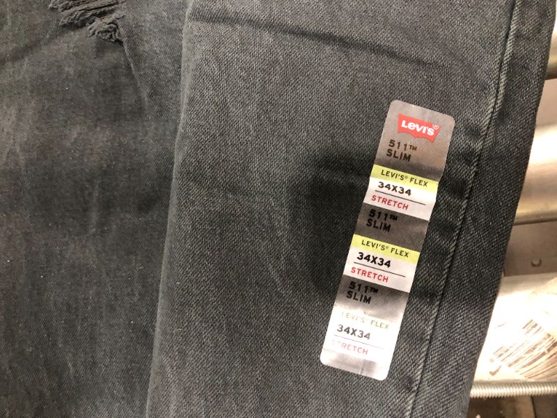 Photo 1 of LEVIS 511 SLIM DISTRESSED JEANS, 34 X 34 STRETCH