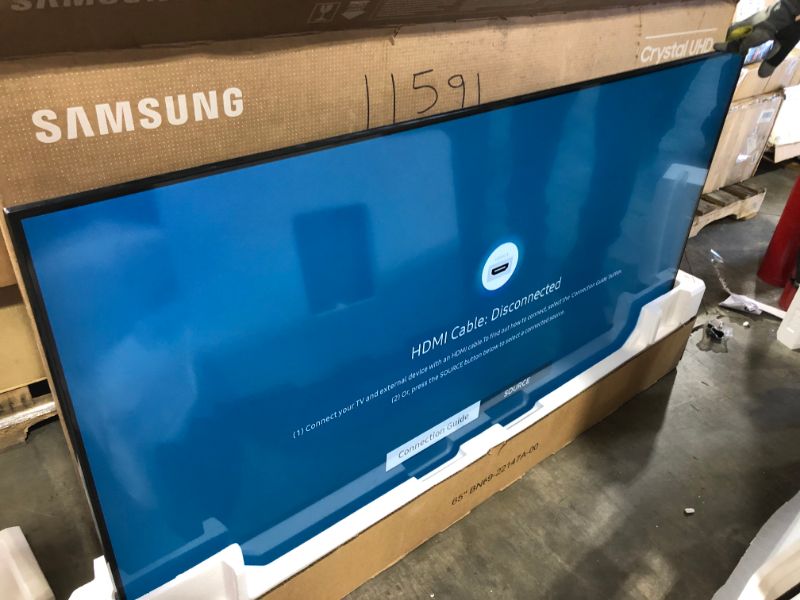 Photo 1 of SAMSUNG 65-Inch Class Crystal UHD AU8000 Series - 4K UHD HDR Smart TV with Alexa Built-in (UN65AU8000FXZA, 2021 Model)