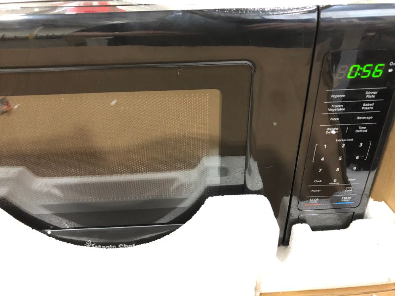 Photo 4 of Magic Chef 0.7 cu. ft. Countertop Microwave (Black with Gray Cavity)