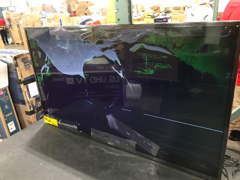 Photo 3 of LG 50 inch Class 4K Smart UHD TV with AI ThinQ® (49.5'' Diag) ( Heavily Damaged) For Parts