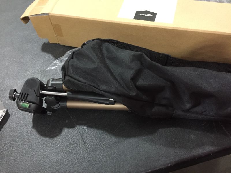 Photo 1 of Amazon Basics Lightweight Camera Mount Tripod Stand with Bag - 16.5-50 Inches & Wireless Remote Control Shutter Release for Nikon Digital SLR Camera
