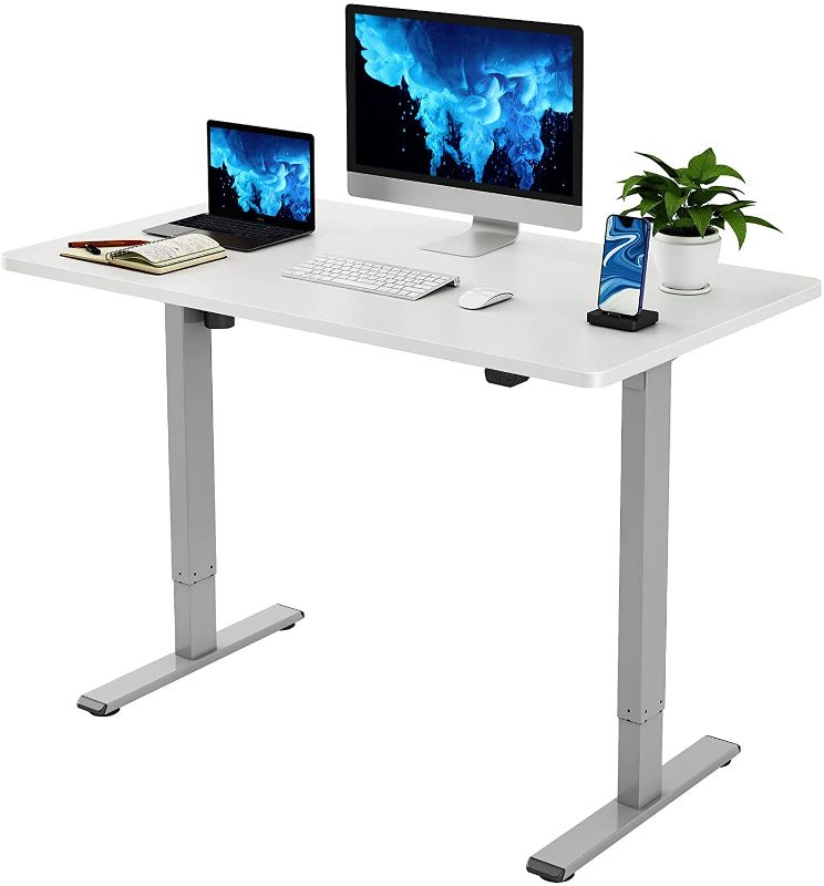 Photo 1 of Vari Essential Electric Standing Desk 48" x 24" - Height Adjustable Sit to Stand Desk for The Home Office - Solid Top Desktop with Stable T-Style Legs (Black)
