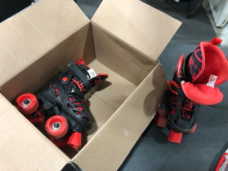 Photo 1 of BLACKRED KIDS ROLLER SKATES SIZE 122