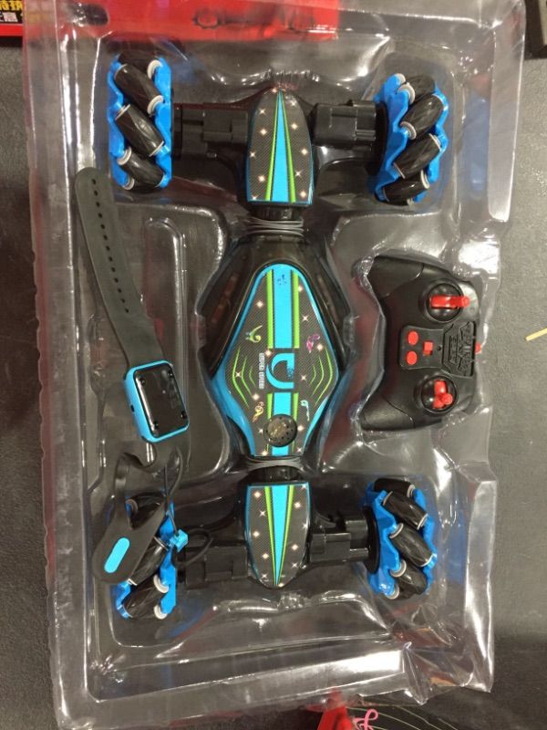 Photo 1 of Contixo SC1 RC Stunt Car Gesture Sensing Twisting Vehicle Drift Car Kids Toy
(needs batteries) 