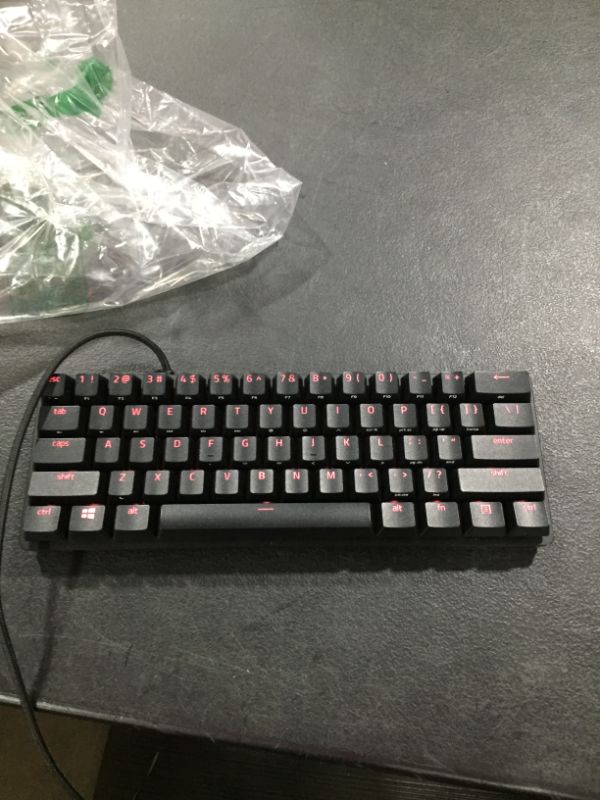 Photo 2 of Razer Huntsman Mini 60% Gaming Keyboard: Fastest Keyboard Switches Ever - Linear Optical Switches - Chroma RGB Lighting - PBT Keycaps - Onboard Memory - Classic Black