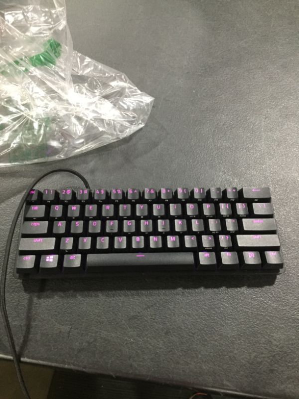 Photo 3 of Razer Huntsman Mini 60% Gaming Keyboard: Fastest Keyboard Switches Ever - Linear Optical Switches - Chroma RGB Lighting - PBT Keycaps - Onboard Memory - Classic Black