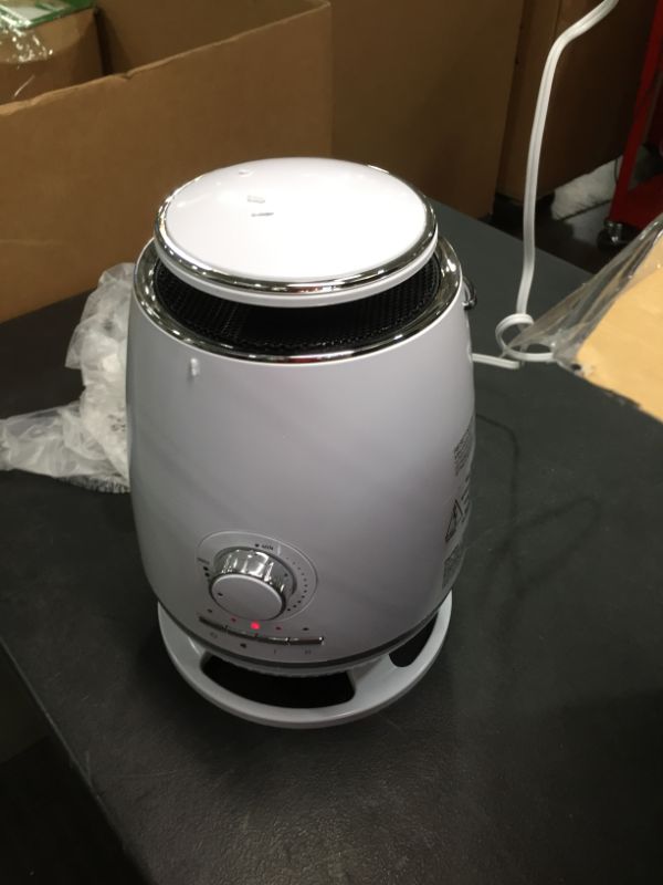 Photo 1 of Joy Pebble Portable Ceramic Space Heater for Home and Office Indoor Use with Adjustable Thermostat Overheat Protection and Carrying Handle ETL Listed