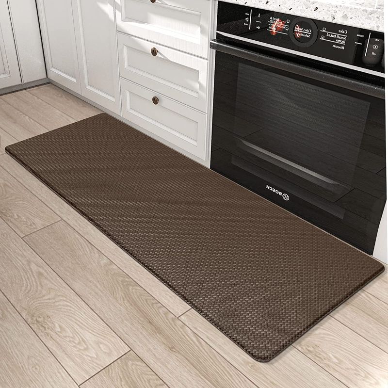 Photo 1 of DEXI Kitchen Rug Anti Fatigue,Non Skid Cushioned Comfort Standing Kitchen Mat Waterproof and Oil Proof Floor Runner Mat, Easy to Clean, 17"x59", Brown, NEW