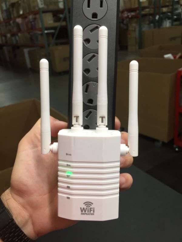 Photo 2 of WiFi Range Extender 1200Mbps Wireless Signal Repeater Booster 24  5GHz Dual Band 4 Antennas 360 Full Coverage Extend WiFi Signal to Smart Home  Alex Devices White