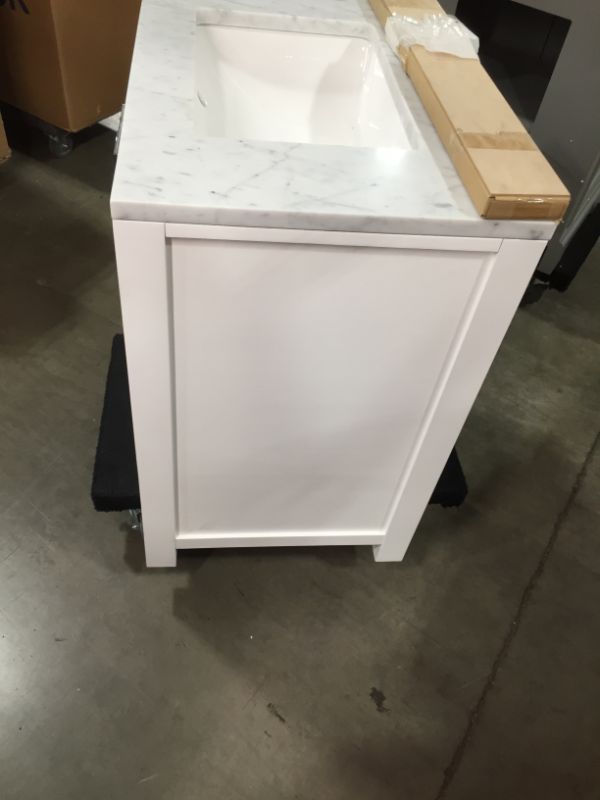 Photo 6 of Madison 30 W in. 21 L x 34 in H Vanity in Modern White with Marble Vanity Top in Carrara White, This Piece Is in Great Condition, There are 3 Minor Scratches on The Front Left Top Side, Easy Fix