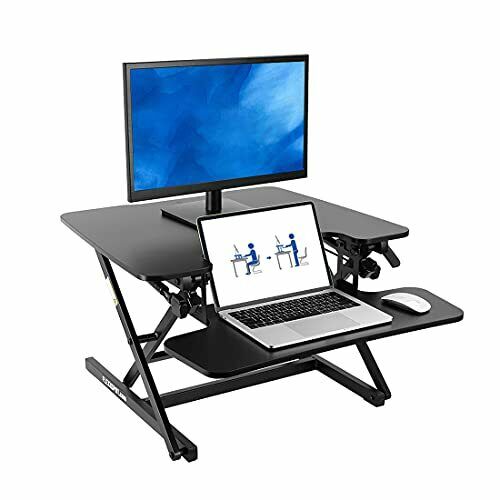 Photo 1 of FLEXISPOT Height Adjustable Standing Desk Converter - 27'' Stand Up Desk 