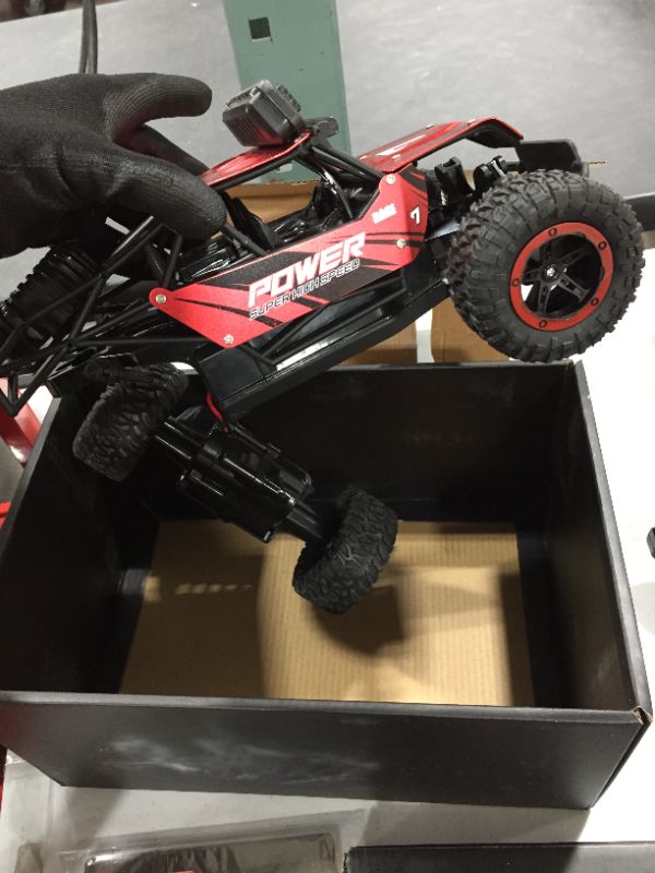 Photo 5 of BEZGAR 17 Toy Grade 1:14 Scale Remote Control Car, 2WD High Speed 20 Km/h All Terrains Electric Toy Off Road RC Monster Vehicle Truck Crawler with Two Rechargeable Batteries for Boys Kids and Adults
