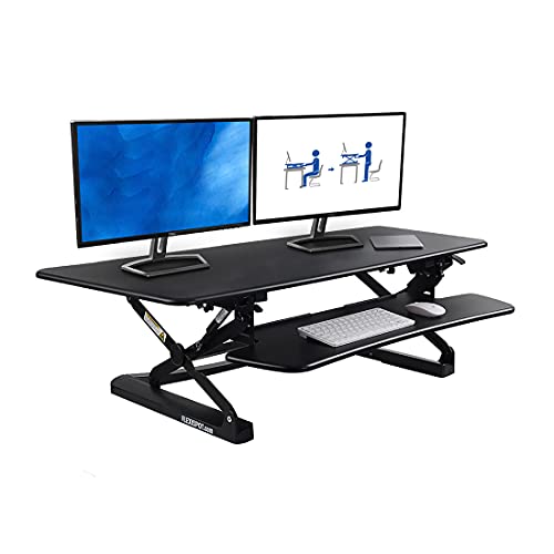 Photo 1 of FlexiSpot Height Adjustable Standing Desk Converter 47 Inch Stand Up Desk Riser, Wide Black Home Office Desk for Dual Monitor Workstations