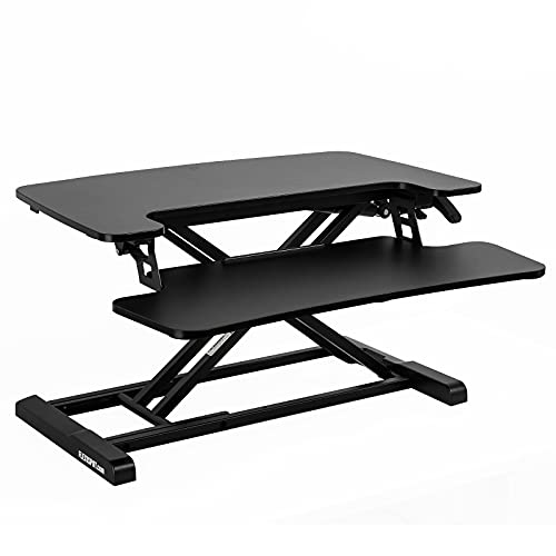 Photo 1 of FLEXISPOT Standing Desk Converter 28 Inches Stand up Desk Riser, Height Adjustable Home Office Desk with Deep Keyboard Tray for Laptop (M7B)
