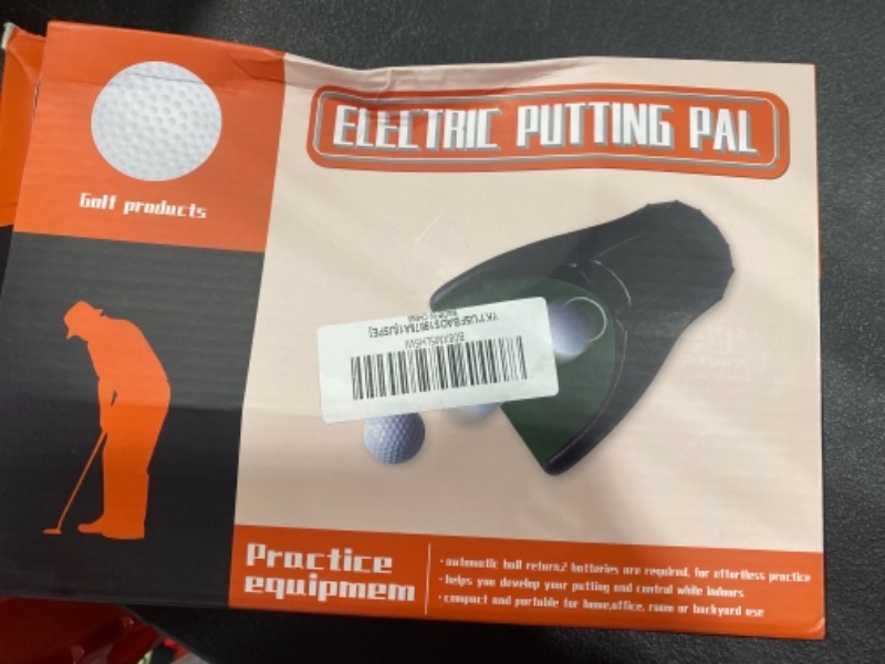 Photo 1 of ELECTRIC PUTTING PAL, GOLF PRODUCTS 