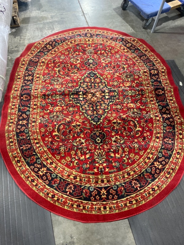 Photo 1 of 58"x74" carpet, red oval 