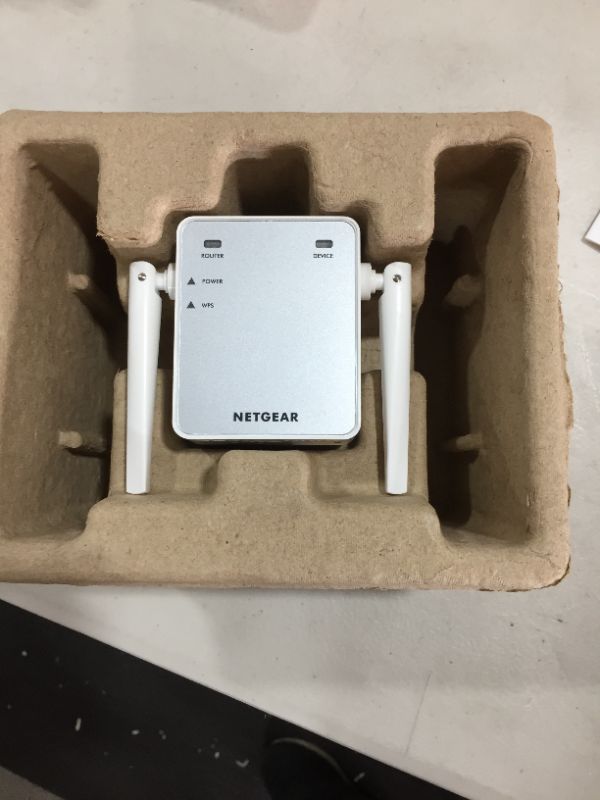 Photo 2 of NETGEAR Wi-Fi Range Extender EX2700 - Coverage Up to 800 Sq Ft and 10 devices with N300 Wireless Signal Booster and Repeater (Up to 300Mbps Speed)