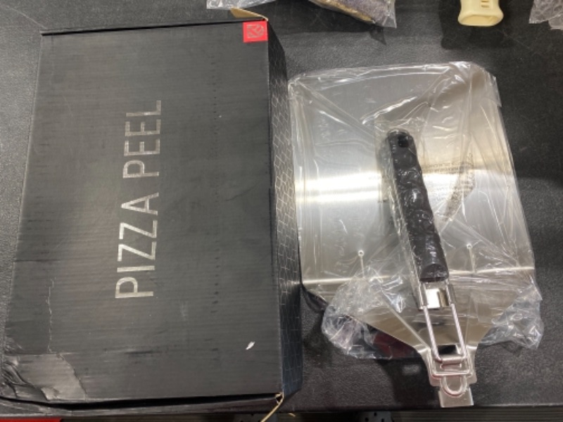 Photo 1 of Collapsible pizza reel 