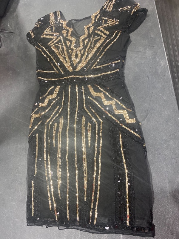 Photo 1 of Gold and black sequence dress