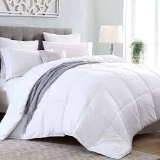 Photo 1 of 90in x 90in white queen comforter