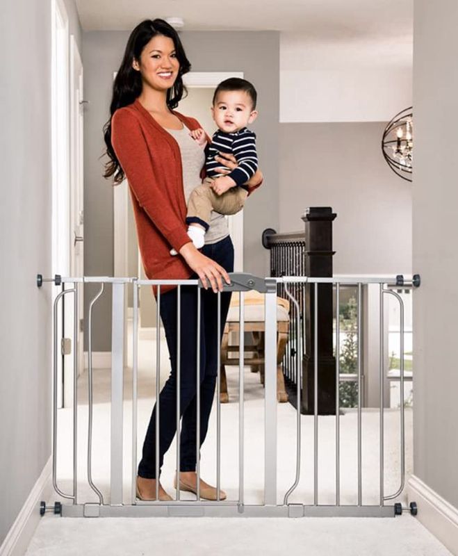 Photo 1 of Easy Step 49-Inch Extra Wide Baby Gate, Includes 4-Inch and 12-Inch Extension Kit, 4 Pack of Pressure Mount Kit and 4 Pack of Wall Mount Kit, Platinum