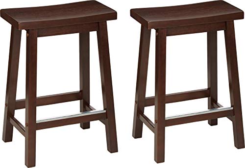 Photo 1 of Amazon Basics Solid Wood Saddle-Seat Kitchen Counter-Height Stool - Set of 2, 24" Counter Stool, Walnut Finish