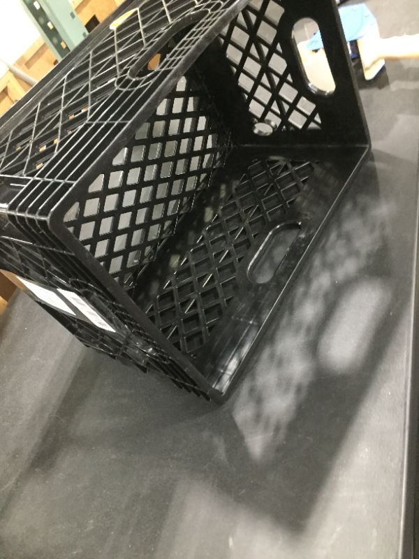 Photo 1 of black milk crate