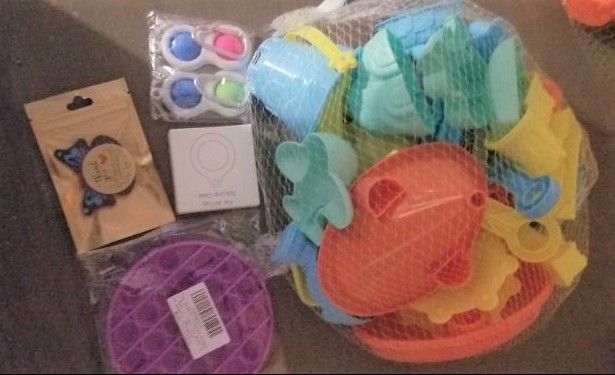 Photo 1 of Kids sandbox set and tik tok famous fidget toy