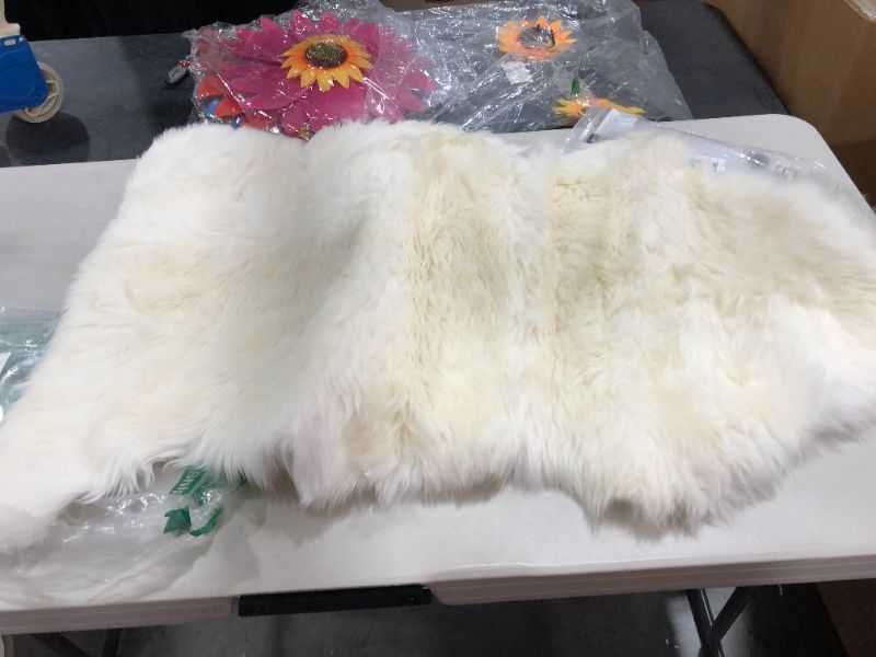 Photo 2 of Faux Fur Area Rug Luxuriously Soft and Eco Friendly Bear Pelt 2 ft. x 4 ft. White Made in France
