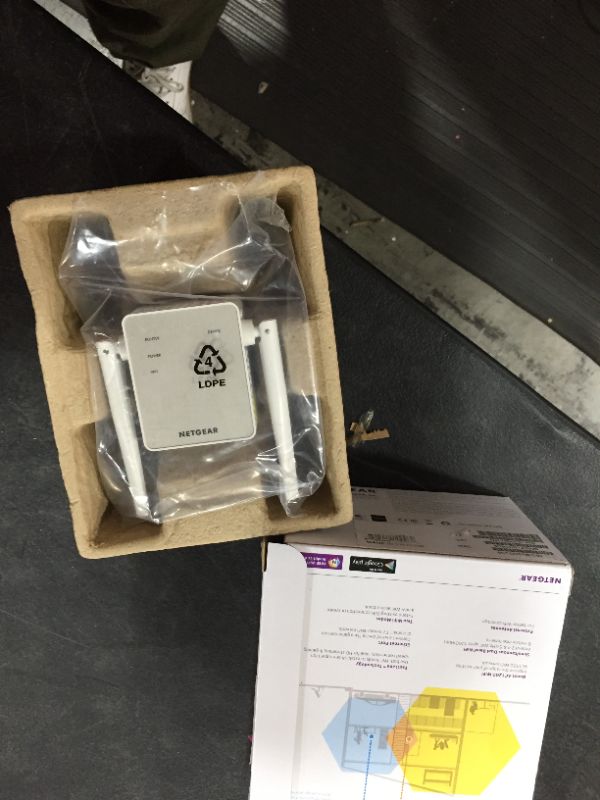 Photo 1 of NETGEAR WiFi Range Extender EX6120-100NAS AC1200 Dual Band Wall Plug Design
