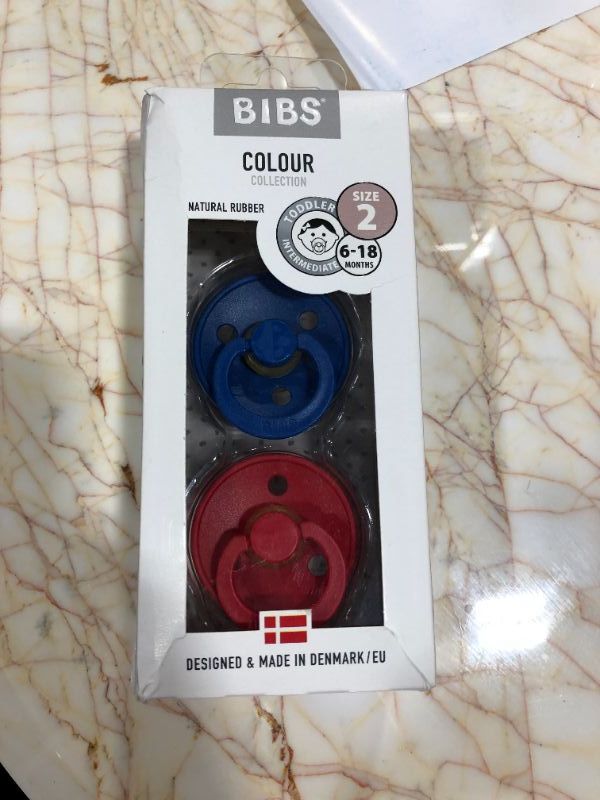 Photo 1 of bibs natural rubber pacifiers blue and red 2 pack