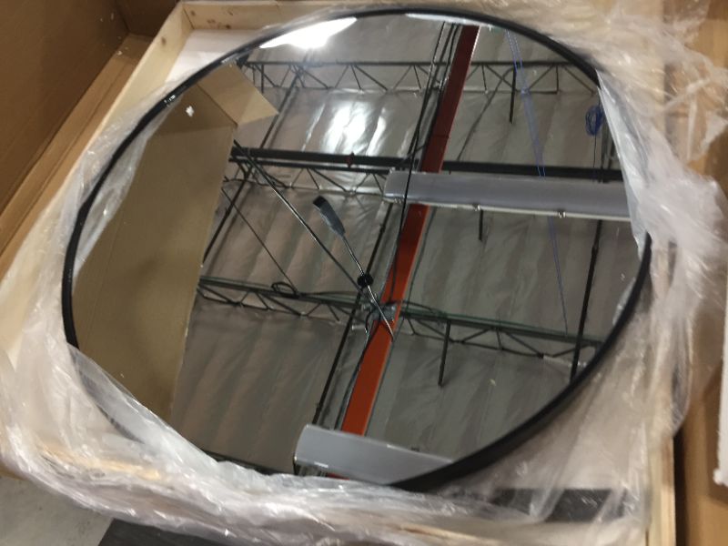 Photo 1 of 28inch diameter mirror with black trim