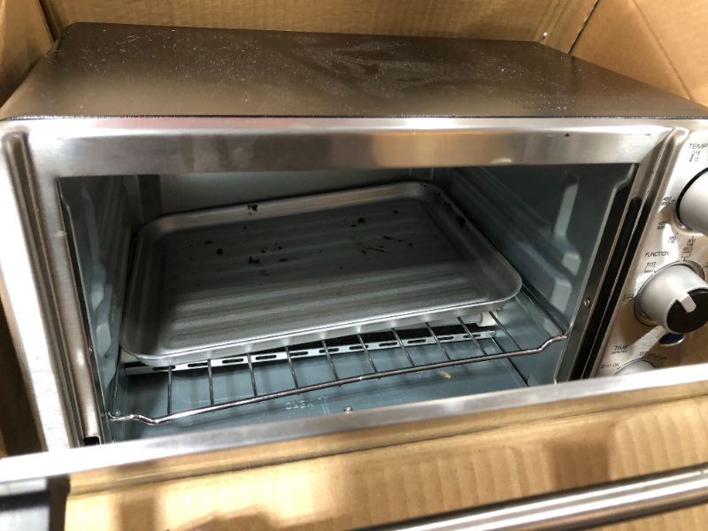 Photo 3 of Toaster Oven 4 Slice, Multi-function Stainless Steel Finish with Timer - Toast - Bake - Broil Settings, Natural Convection - 1100 Watts of Power, Includes Baking Pan and Rack by Mueller Austria
