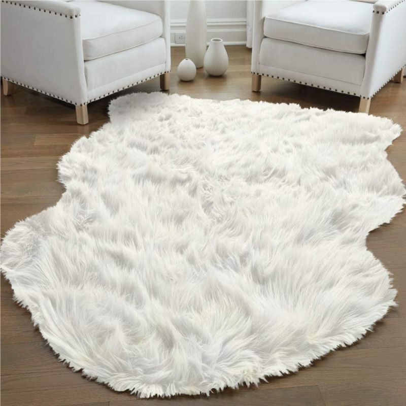 Photo 1 of Gorilla Grip Thick Faux Fur Nursery Rug, 4x6, Fluffy Sheepskin Shag Carpet Rugs for Baby Nursery Room, Babys Bedroom, Luxury Kids Decor, Crib Side Floor Soft Plush Carpets, Ivory
