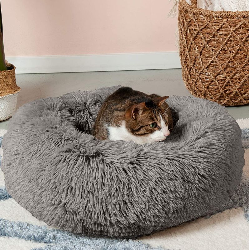 Photo 1 of Furhaven Cozy Pet Beds for Small, Medium, and Large Dogs and Cats - Ultra Calming Plush Donut Bed, Beanbag Style Ball Bed, Self-Warming Cuddler, Travel Dog Bed, and More
