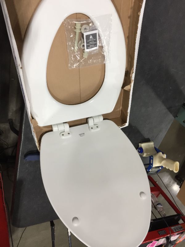 Photo 1 of Jamestown Adjustable Slow Close Never Loosens Elongated Closed Front Toilet Seat in White